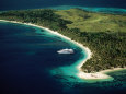 Aerial of Blue Lagoon Cruises Ship Anchored Off Island, Fiji