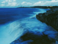 Waves Crash against a Reef