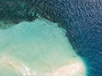 Waves Break on a Reef Out in the Zanzibar Channel, Tanzania